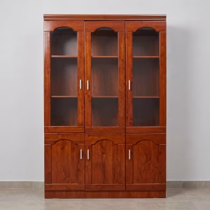 A sleek dark wood 3-Door Executive Filing Cabinet with silver handles standing next to a modern conference layout in an executive corner office.