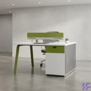 Modern 2-person office workstation featuring a white rectangular desktop, integrated green and grey storage cabinets, and a lime green acoustic privacy screen in a bright, minimalist office setting.