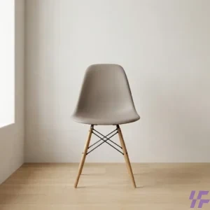 Brown Eames-style dining chair with a contoured molded shell seat and natural wood legs for mid-century modern home or office decor.