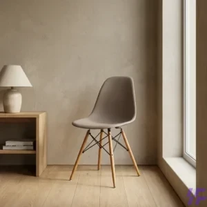 Brown Eames-style dining chair with a contoured molded shell seat and natural wood legs for mid-century modern home or office decor.