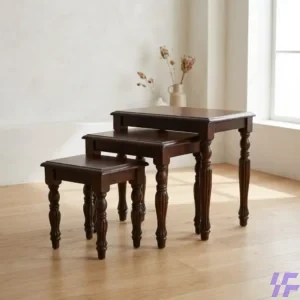 Set of three interlocking wooden nest stools with a natural oak finish and minimalist design, ideal for space-saving side tables or additional seating.