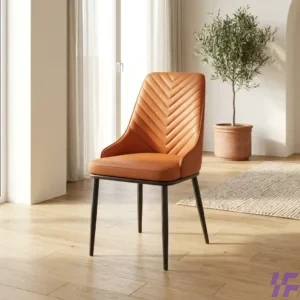 Orange leather dining chair with padded cushioned seat and sturdy metal legs, modern stylish dining seating for home, restaurant, and hospitality spaces in Kenya