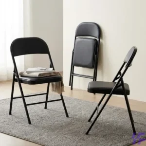 Black foldable study chair with sturdy steel frame and cushioned seat, lightweight space-saving seating solution for students, training rooms, home, and office use in Kenya