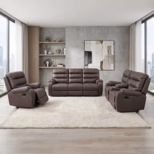 A modern dark gray 6-Seater Recliner Sofa Set arranged with open leg rests in a brightly lit executive corporate lounge area.
